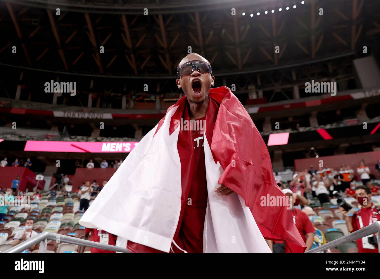 Gold medalist Mutaz Barshim of Qatar celebrates on the track after ...