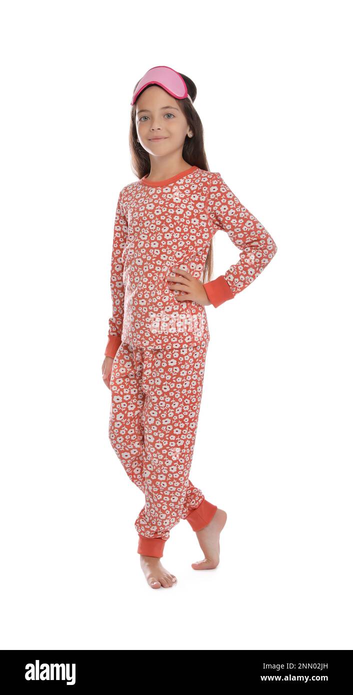 Cute girl wearing pajamas and sleeping mask on white background Stock ...