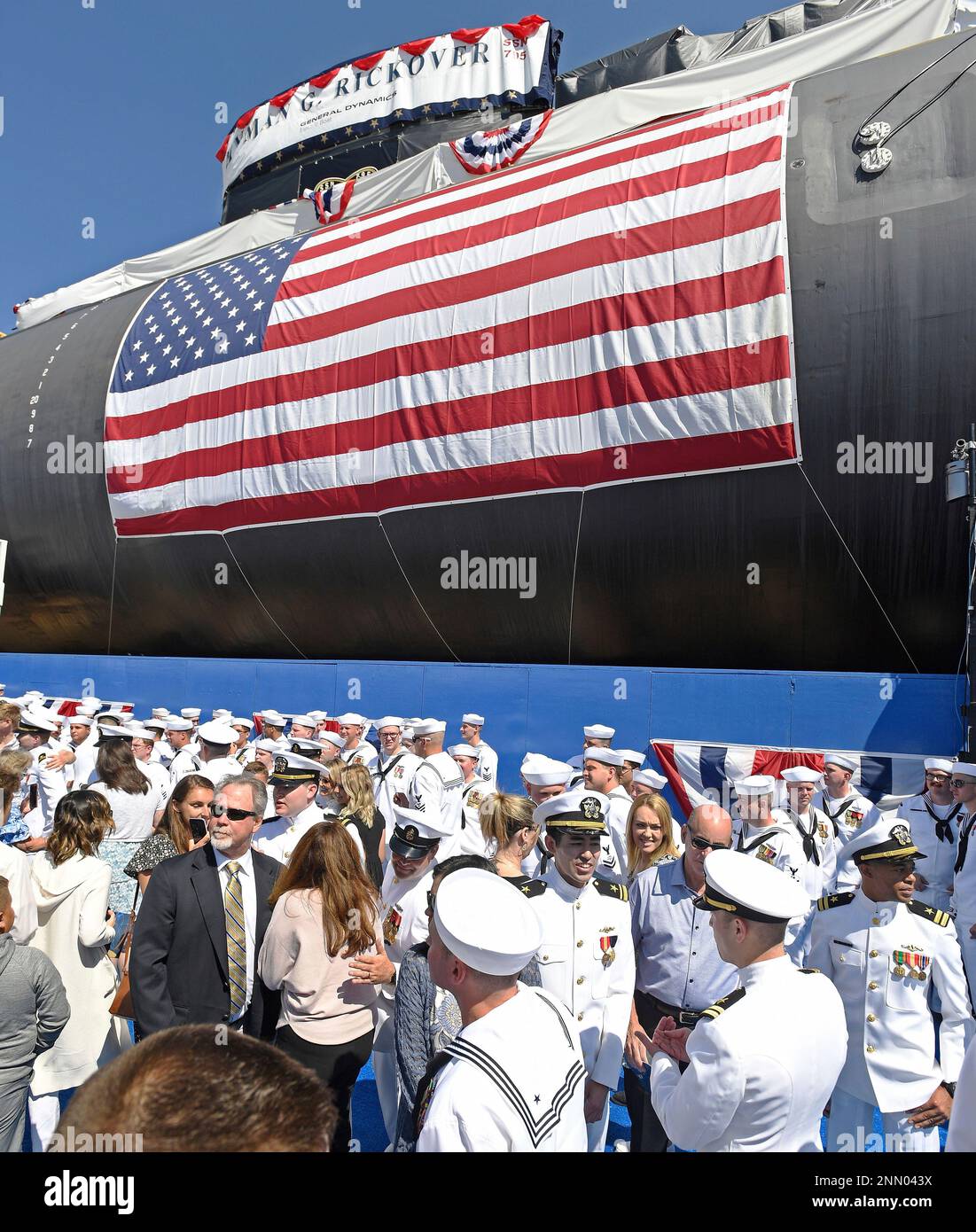 Family members come forward to greet the crew of the Virginiaclass