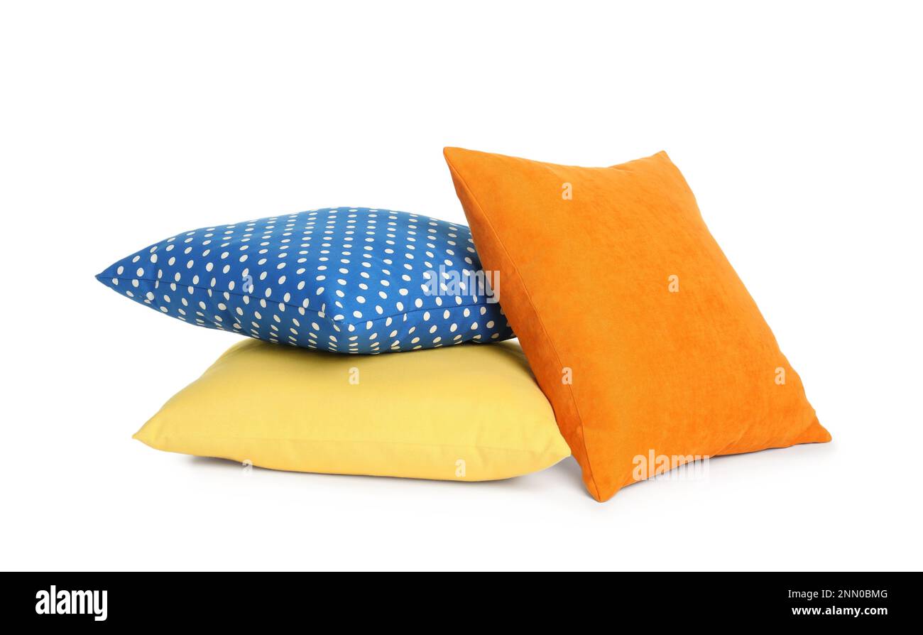 Different colorful decorative pillows on white background Stock Photo