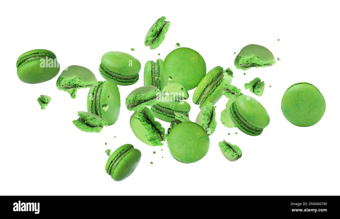 Sweet delicious macarons flying on white background Stock Photo