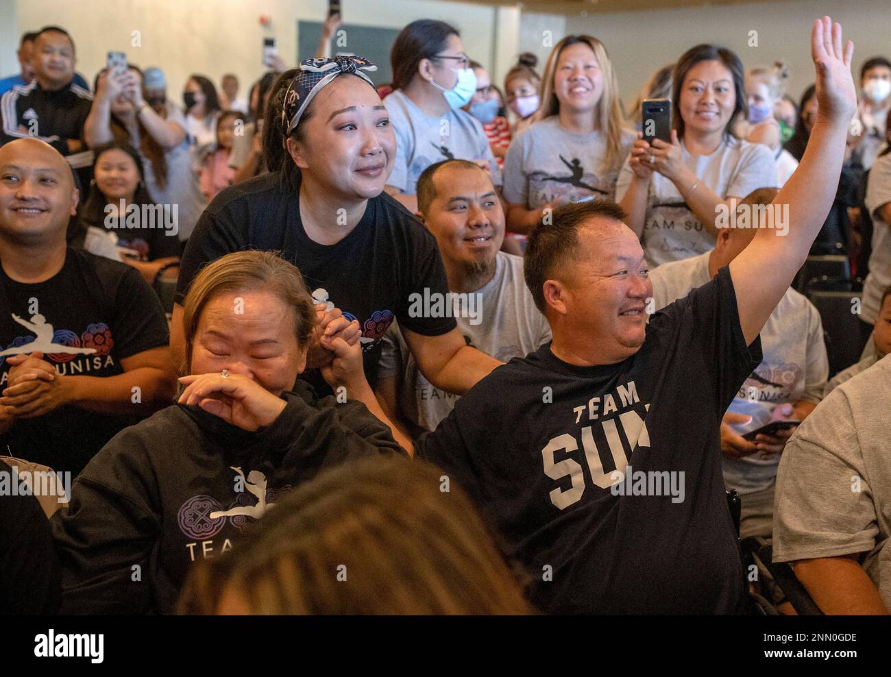 St. Paul Olympian Sunisa Lee's parents Yeev Thoj, left, and John Lee