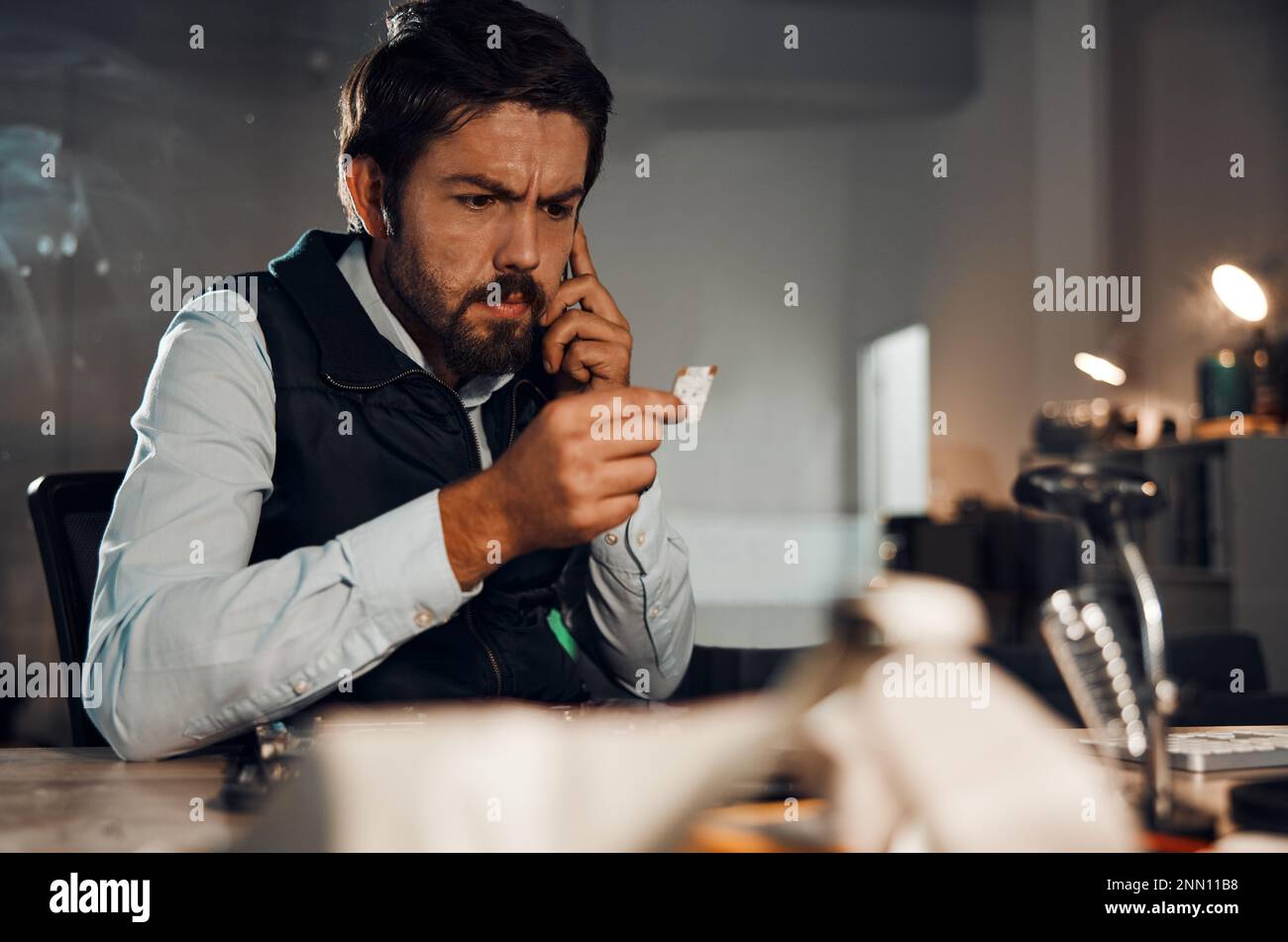 Serious, technician and engineering with man and chip for technology ...