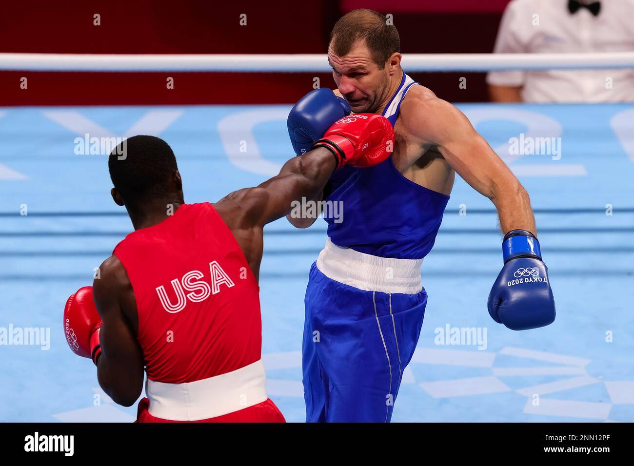 TOKYO, JAPAN - JULY 26: Troy Isley of USA throws a punch during the Men ...