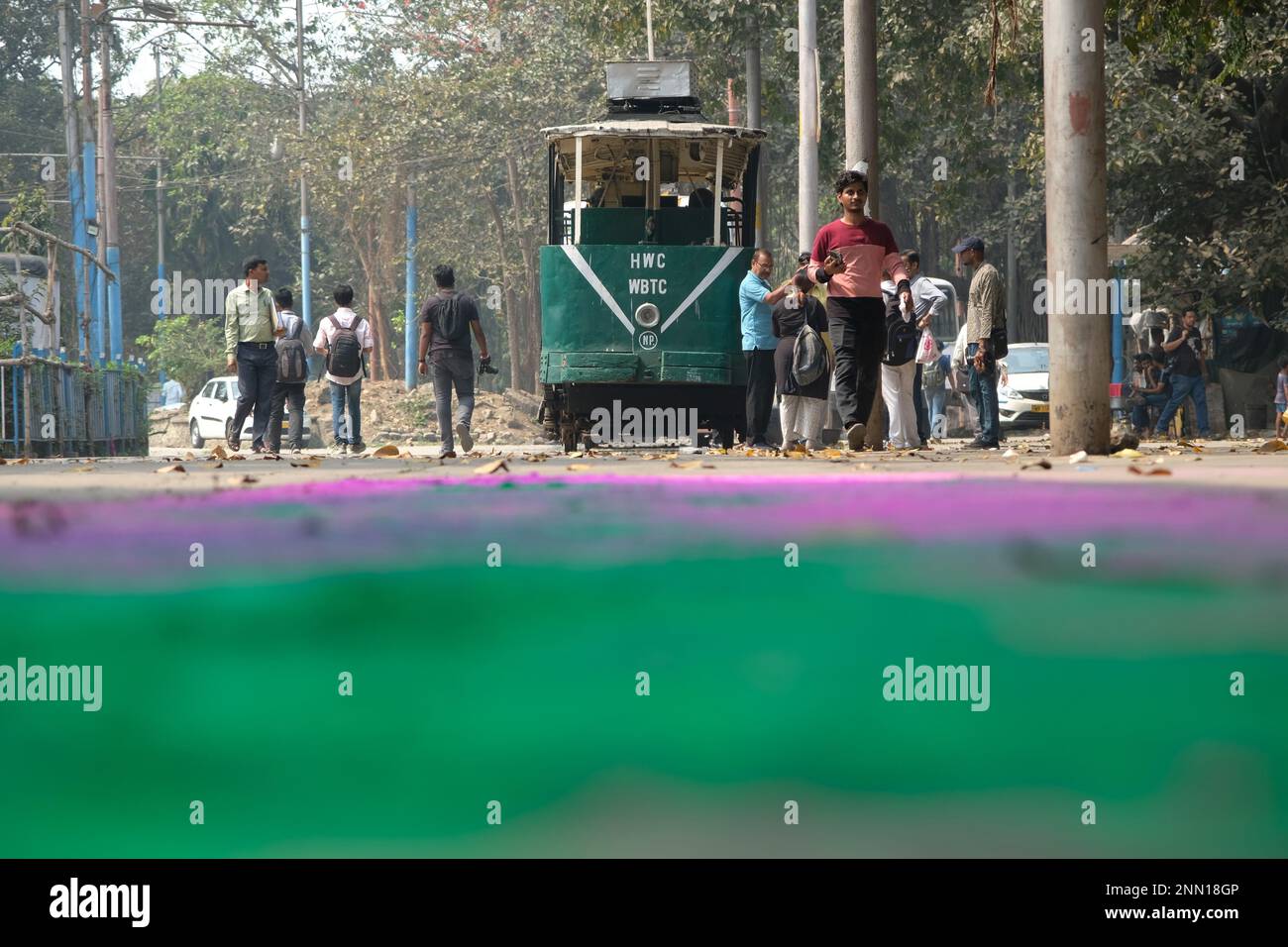 people-gather-surrounding-a-heritage-tram-in-the-esplanade-tram-depot