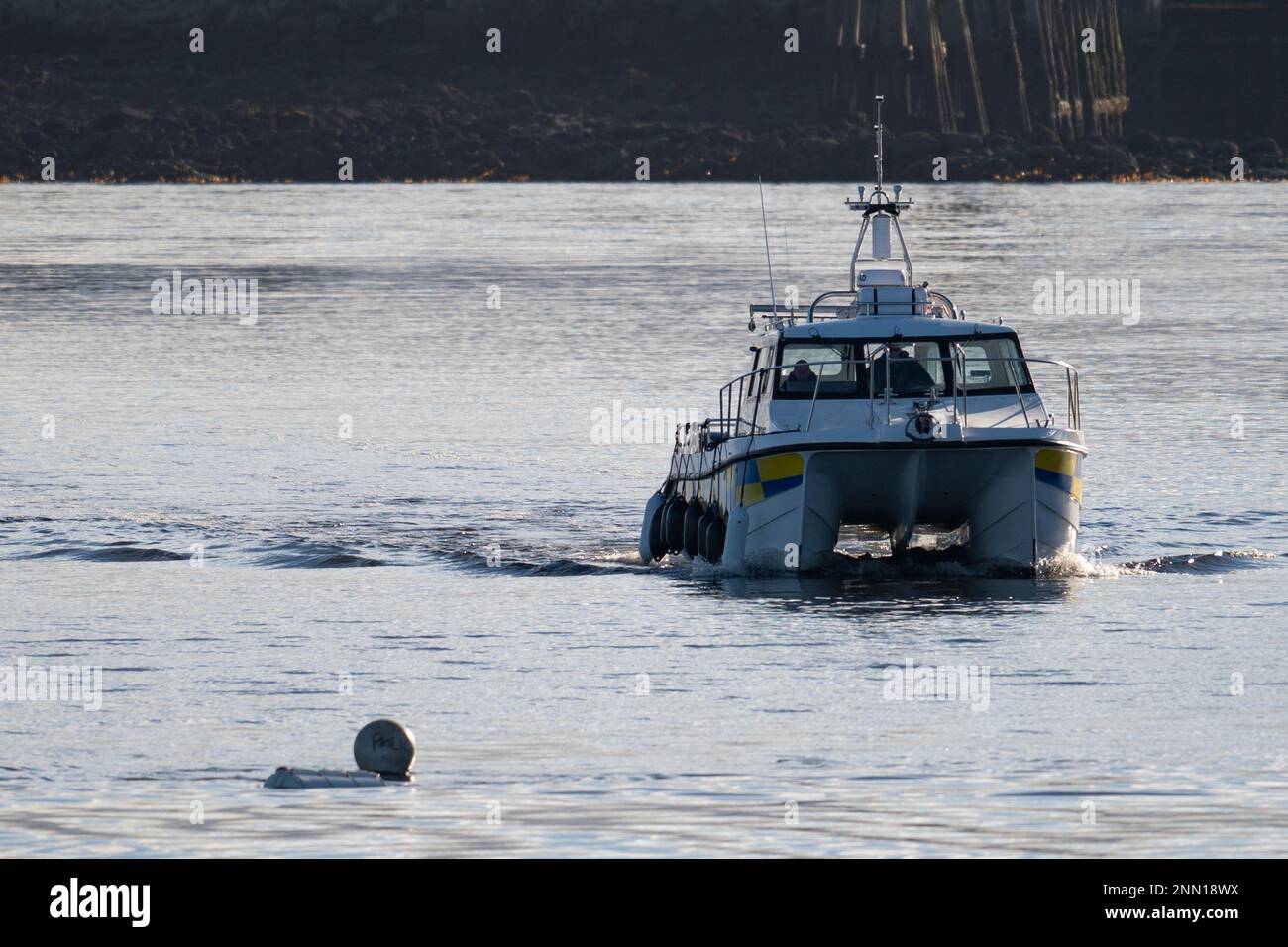 Greenock, Scotland, UK. 25 February 2023. Police and Pilot craft at