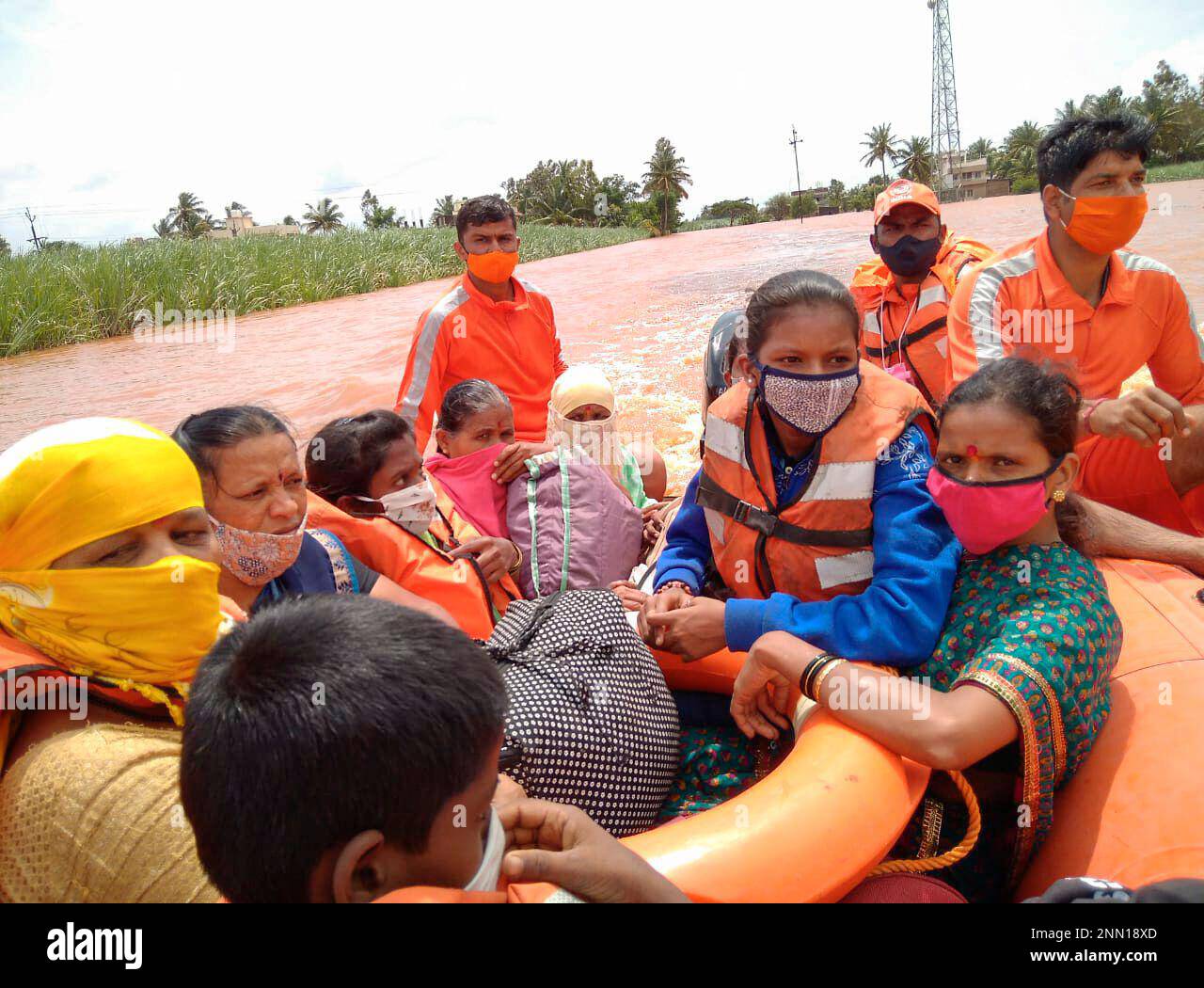 Ndrf While Rescuing This photograph provided by India's National Disaster Response Force ...