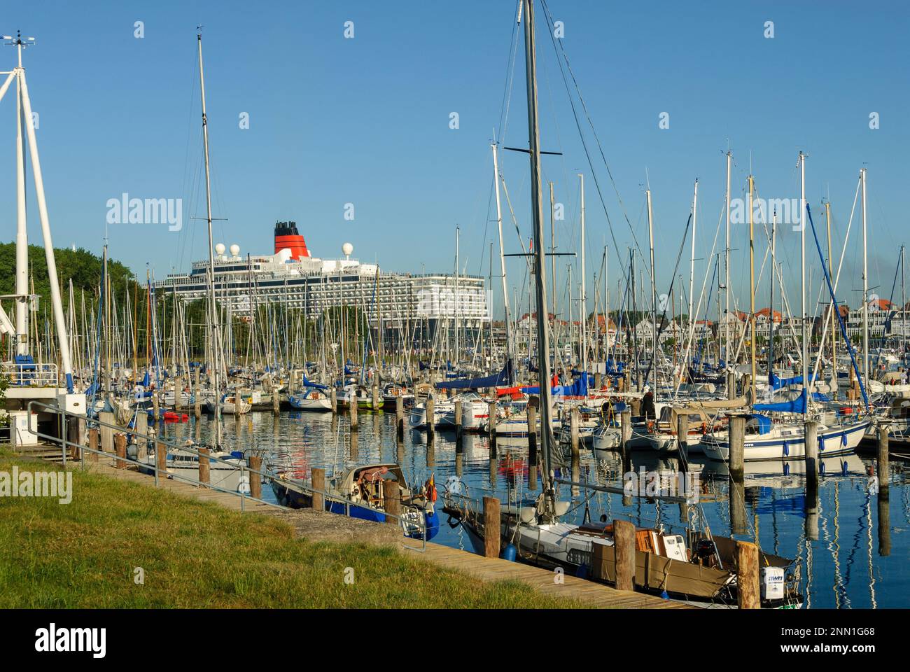 The Luxury Cruise Ship Queen Elisabeth Enters The Port Of Luebeck The Luxury Cruise Ship Queen Elisabeth Enters The Port Of Luebeck