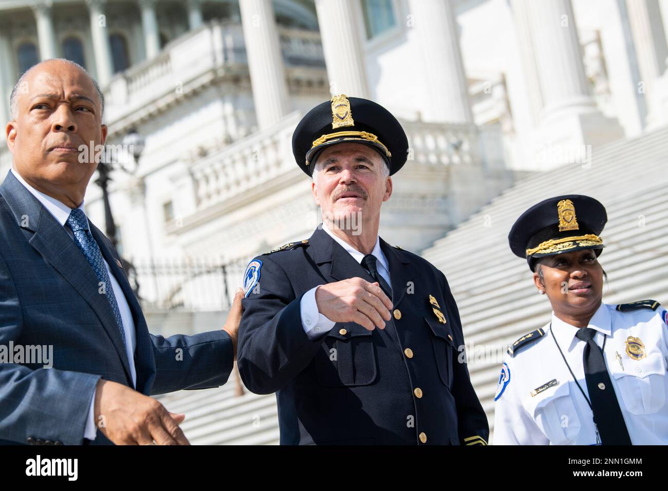 UNITED STATES JULY 23 J. Thomas Manger, center, the new chief of the