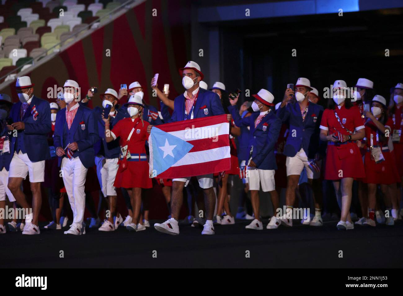 Members of team Puerto Rico arrive during the opening ceremony in the