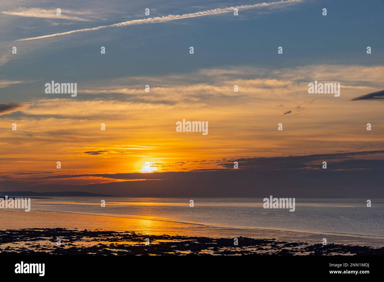 Golden glow along the horizon Stock Photo - Alamy