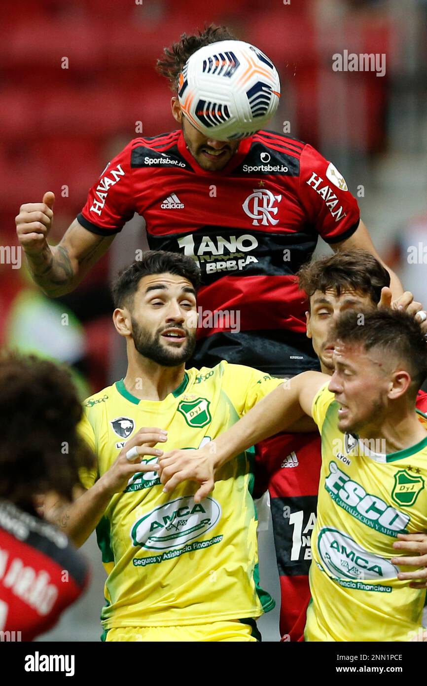 Gustavo Henrique of Brazil's Flamengo, top, heads the ball as