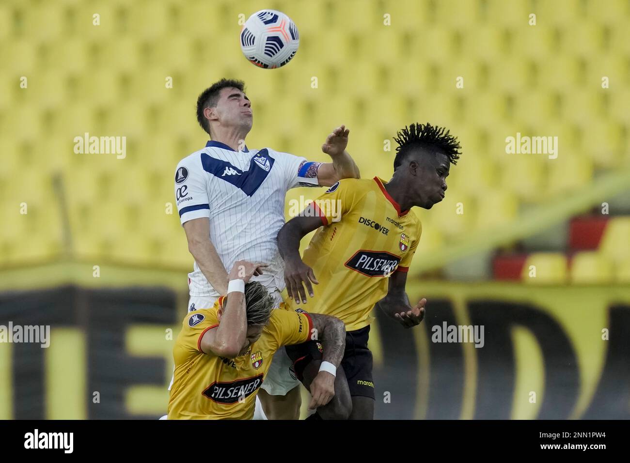 Lautaro Gianetti of Argentina's Velez Sarsfield, top, heads the