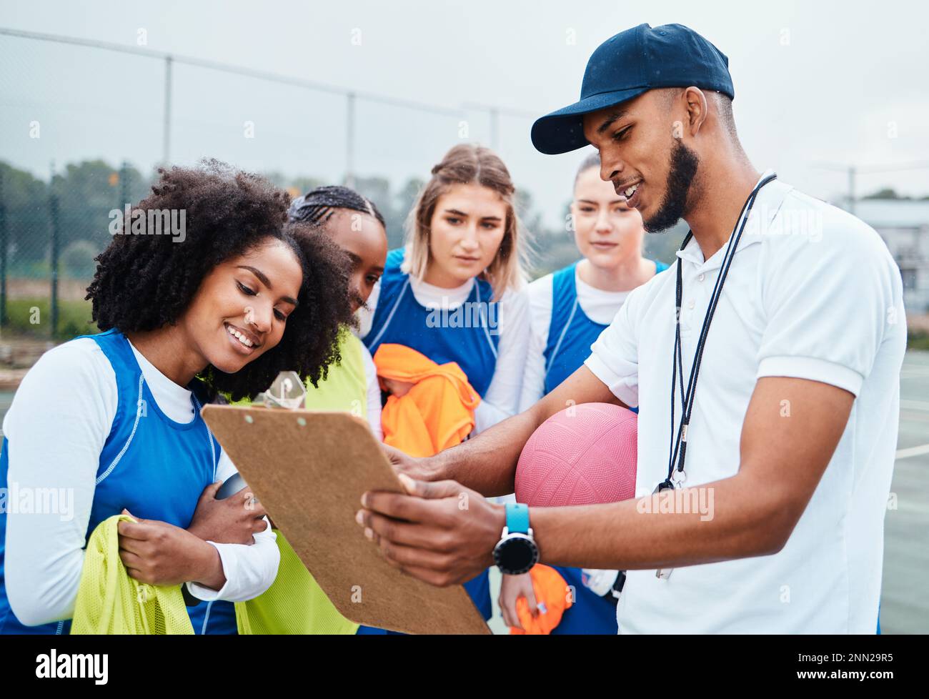Clipboard strategy, netball sports team and coach planning game plan