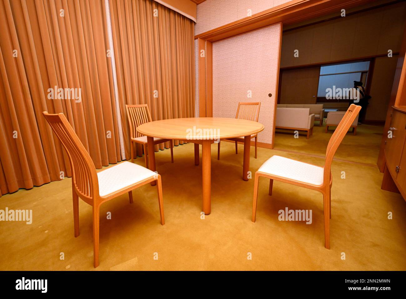 A photo shows a resting and guest room at a renovated residence of