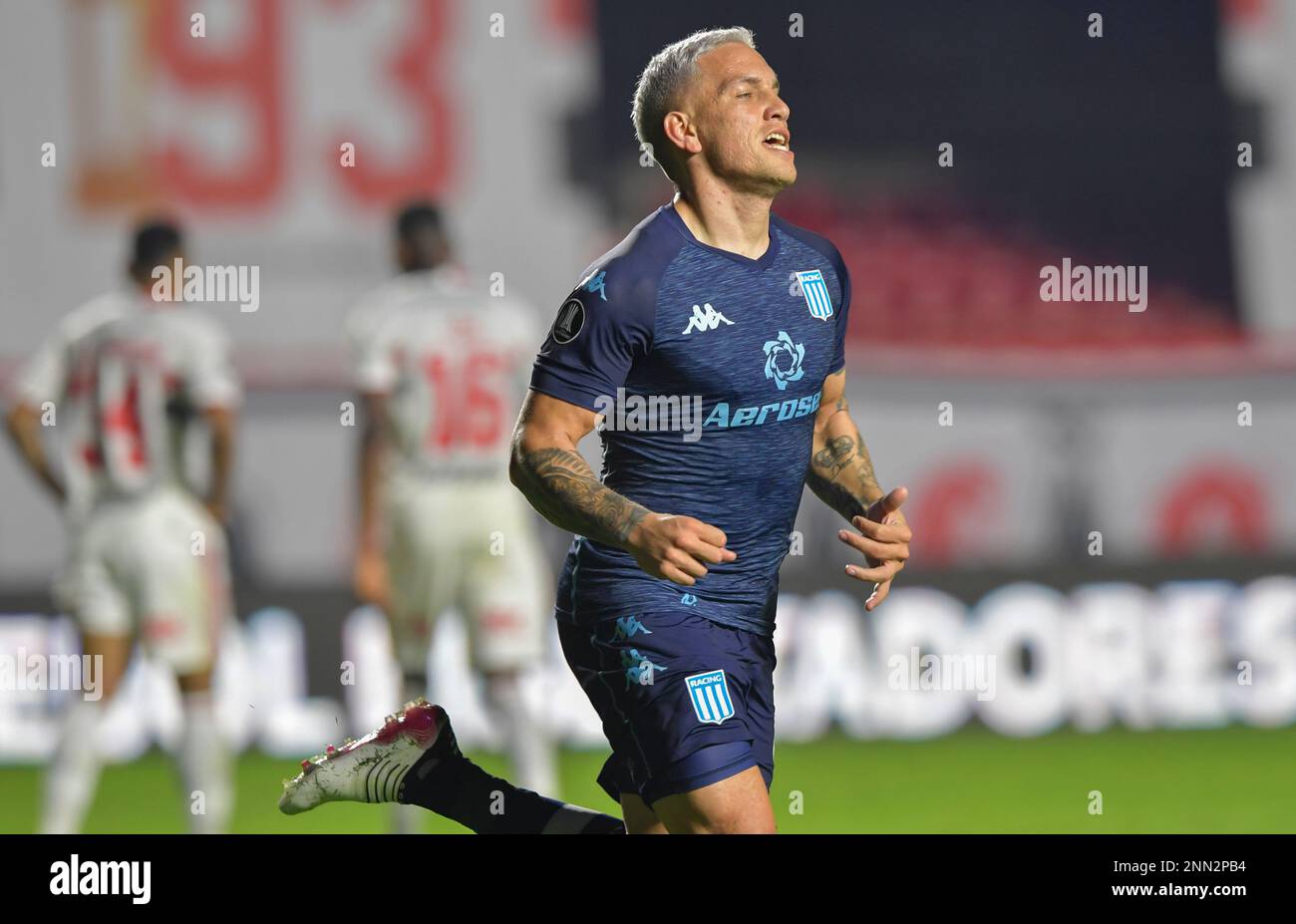 Enzo Copetti of Argentina's Racing Club, back, and Horacio