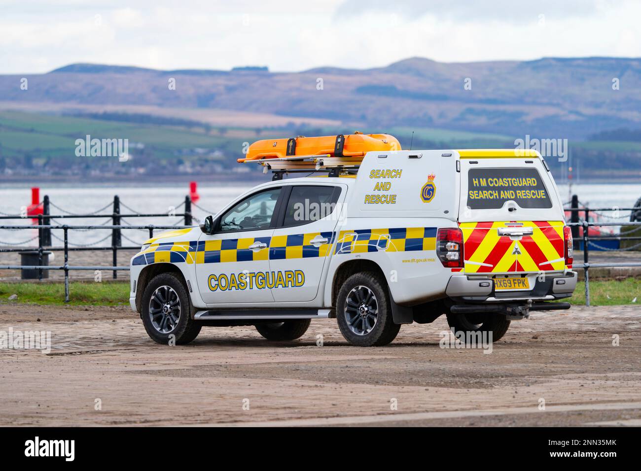 Greenock, Scotland, UK. 25 February 2023. Police and Pilot craft at scene of sinking of the Clyde Marine Services tug Biter that sunk Near East India Harbour in Greenock yesterday .   Two crew members are still missing. Pic; Coastguard at the scene. . Iain Masterton/Alamy Live News Stock Photo