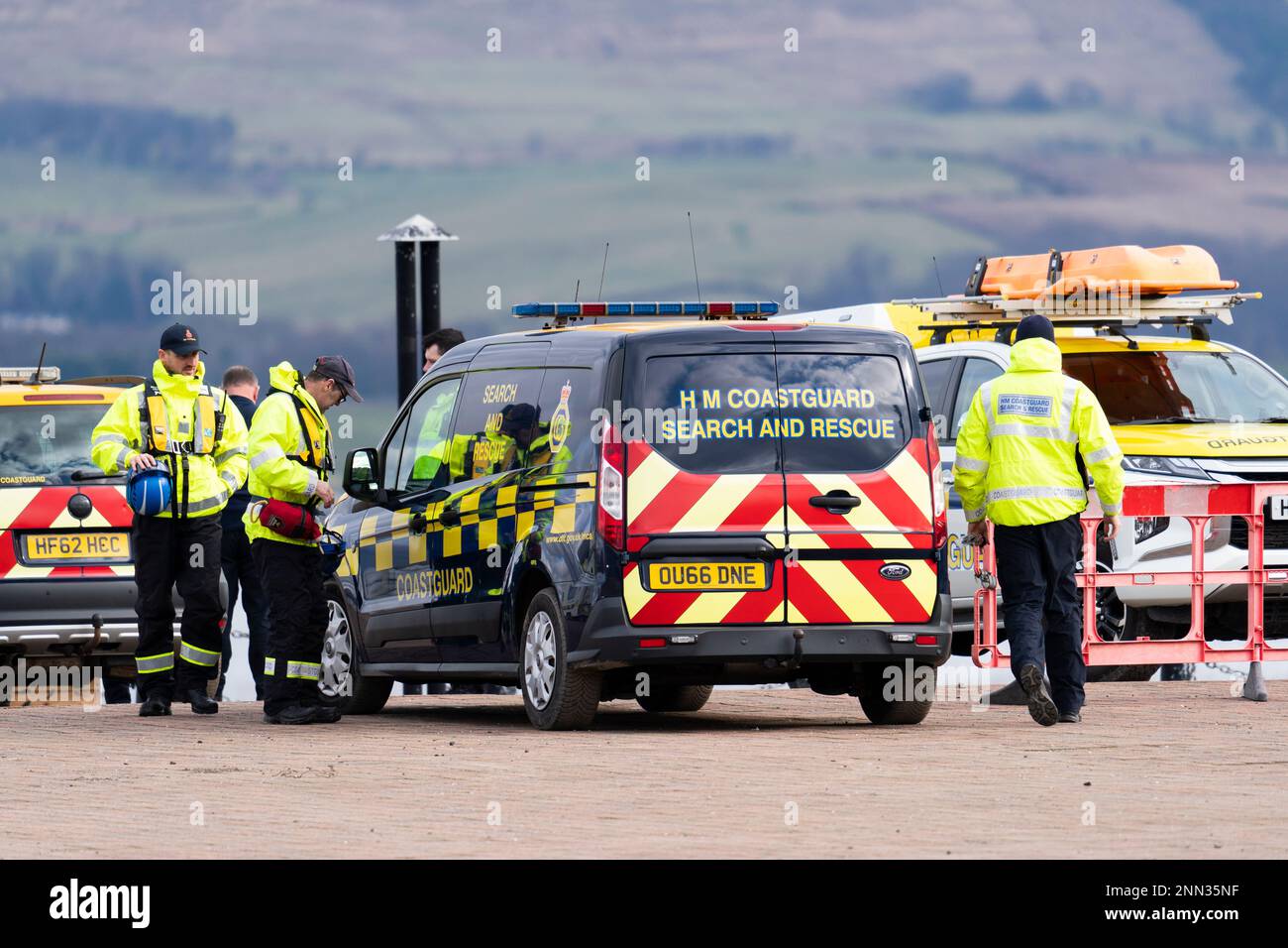 Greenock, Scotland, UK. 25 February 2023. Police and Pilot craft at scene of sinking of the Clyde Marine Services tug Biter that sunk Near East India Harbour in Greenock yesterday .   Two crew members are still missing. Pic; Coastguard at the scene. . Iain Masterton/Alamy Live News Stock Photo