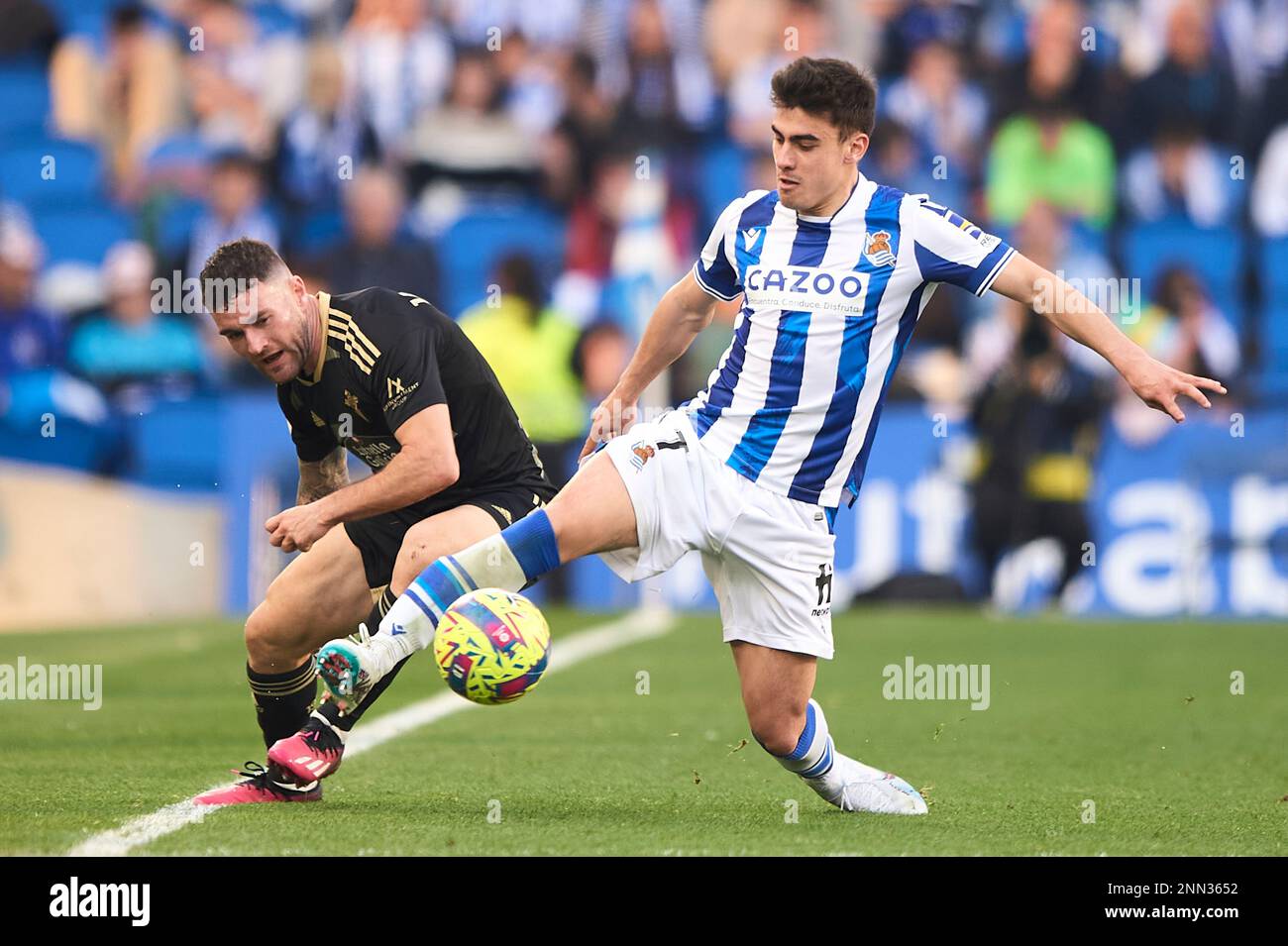 Ander Barrenetxea of Real Sociedad and Javi Galan of RC Celta in action during the La Liga Santander match between Real Sociedad and RC Celta CF at Re Stock Photo