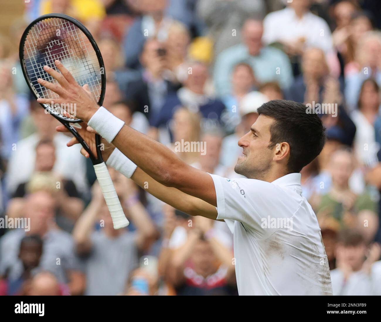 Novak Djokovic of Serbia reacts after winning the mens singles semifinal of the Championships, Wimbledon against Denis Shapovalov of Canada at the All England Lawn Tennis and Croquet Club in London, United