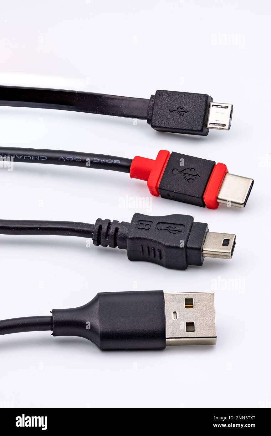 The different USB plugs, cables and standards like USB-A or USB-C often lead to confusion, isolated in the studio Stock Photo