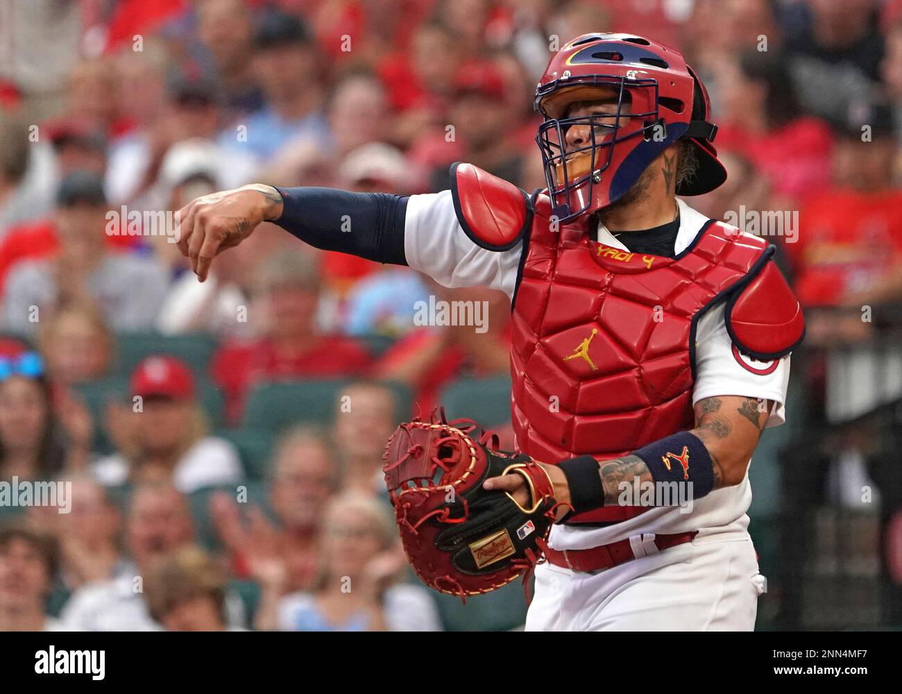 ST. LOUIS, MO - JUNE 25: St. Louis Cardinals Catcher Yadier Molina (4)  makes a throw during a game between the St. Louis Cardinals and the  Pittsburgh Pirates at Busch Stadium in