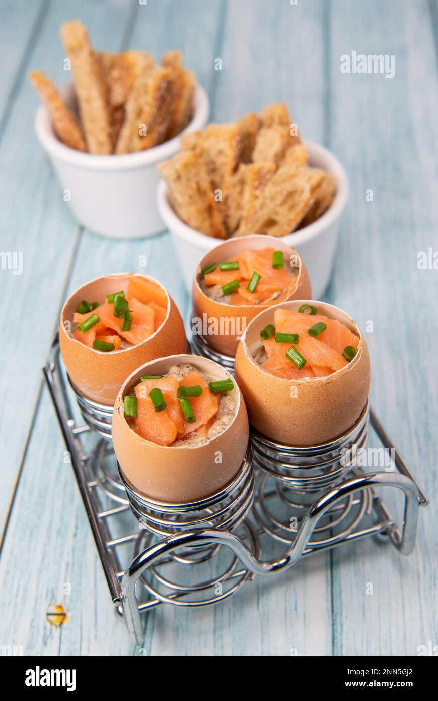 Recipe eggs casserole cooked in the shell with mushroom cream sauce and