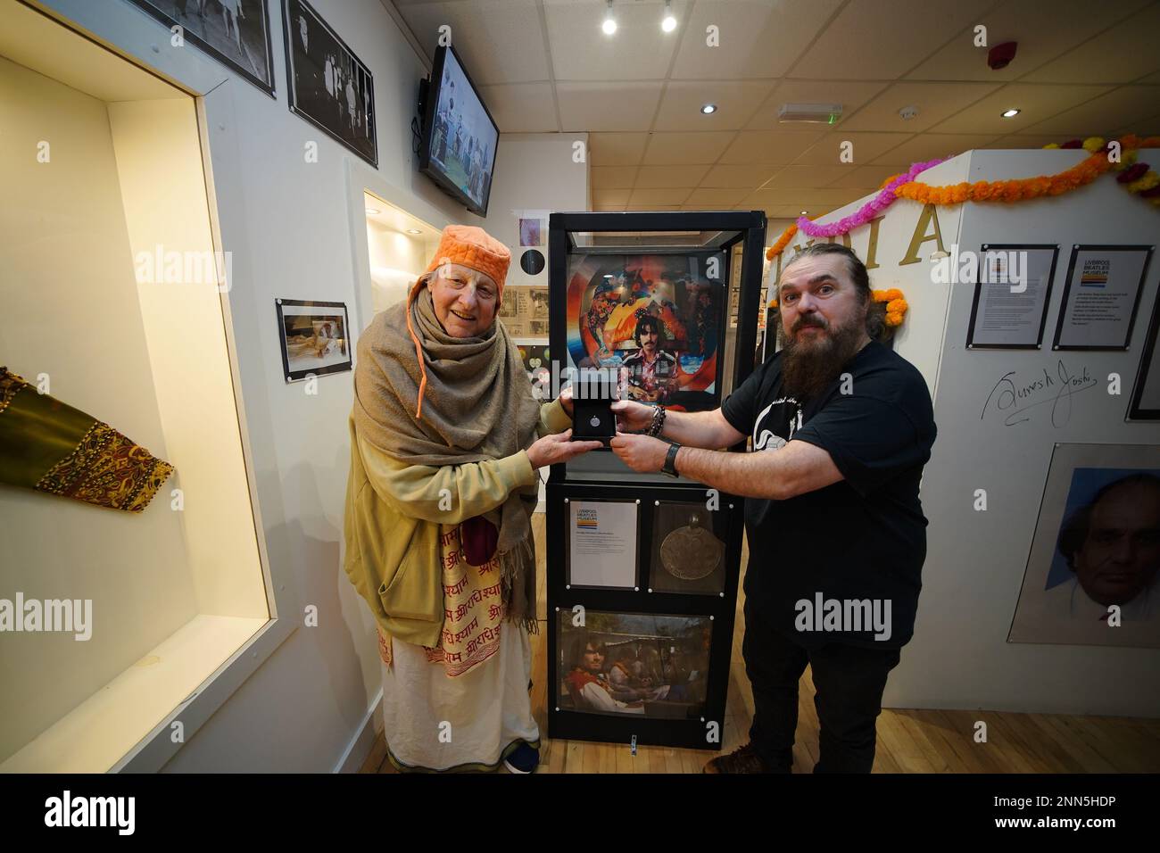Museum owner Roag Best is joined by Hare Krishna followers with a ...