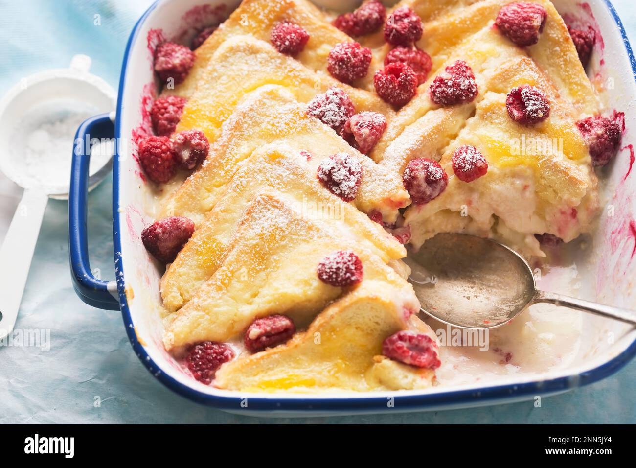 Bread and butter pudding with lemon curd, vanilla custard and