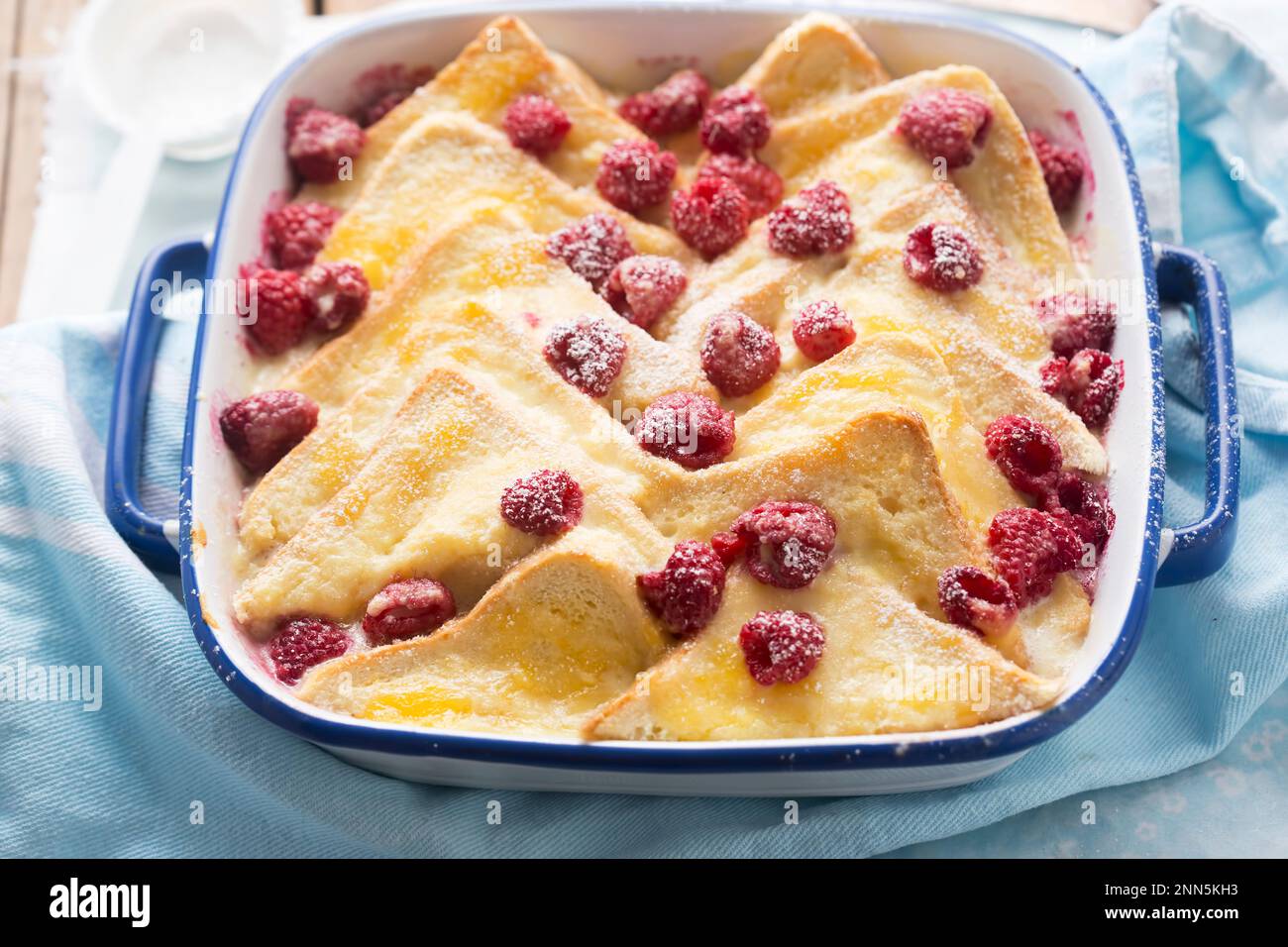 Bread and butter pudding with lemon curd, vanilla custard and