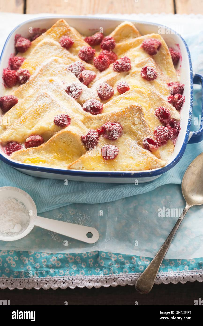 Bread and butter pudding with lemon curd, vanilla custard and