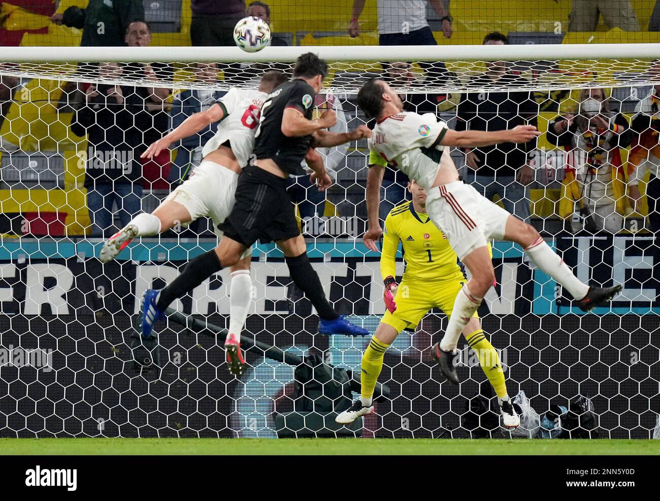 Germany's Mats Hummels, centre, heads on goal during the Euro 2020