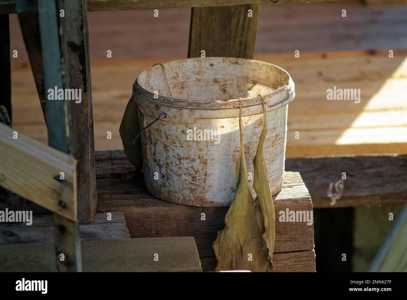old plastic bucket of garbage, in the village Stock Photo Alamy