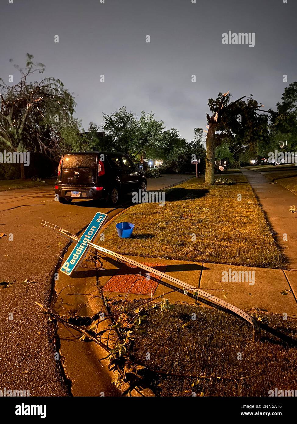 CORRECTS CITY TO WOODRIDGE INSTEAD OF WOODBRIDGE A street sign is bent over in Woodridge, Ill