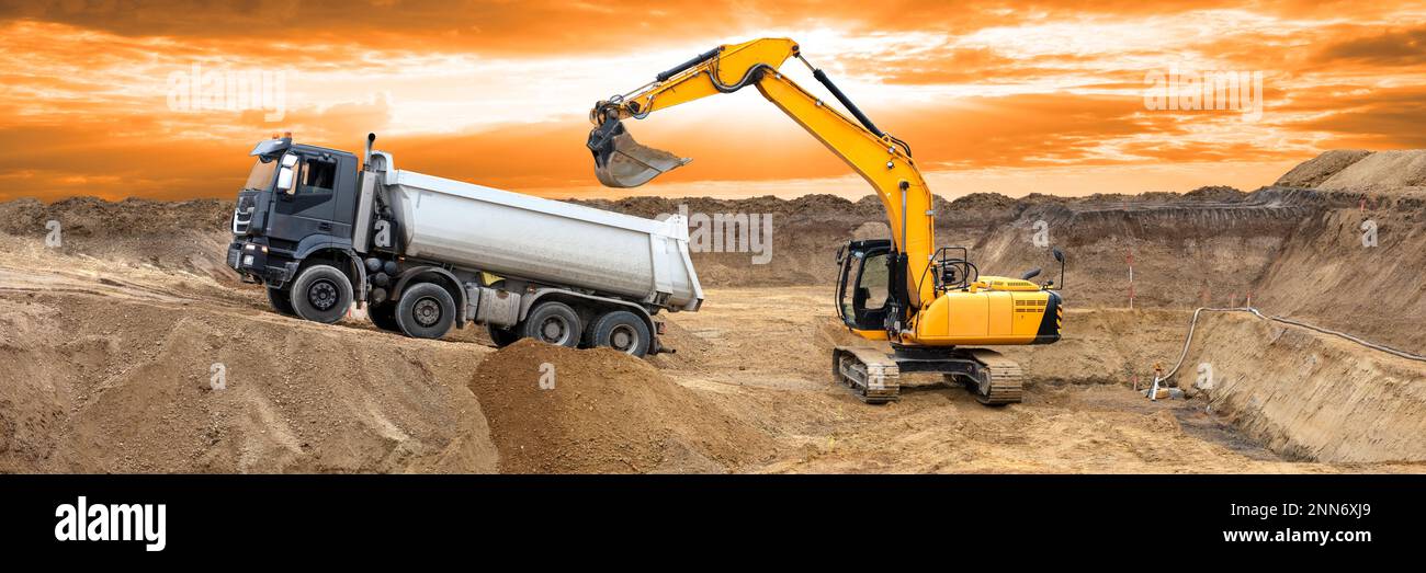 excavator is digging and working at construction site Stock Photo