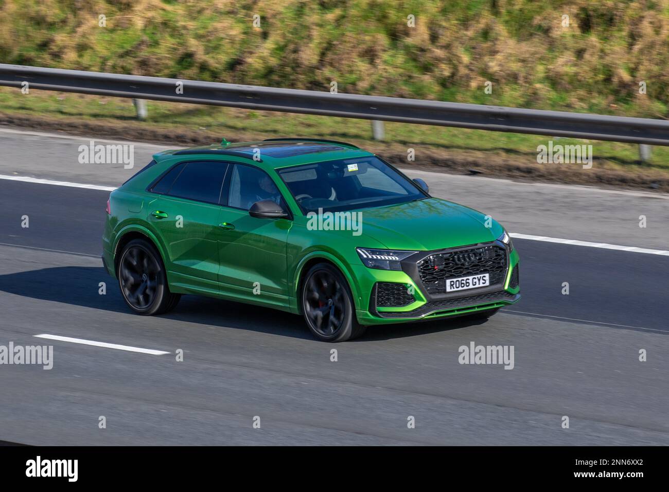 2020 Green AUDI RS Q8 CARBN BLK TFSI MHEV QT A RS VORSPRUNG QUATTRO 3996cc Petrol 8-speed automatic Roadster, moving, being driven, electric cars in motion, travelling on the M6 motorway, UK Stock Photo