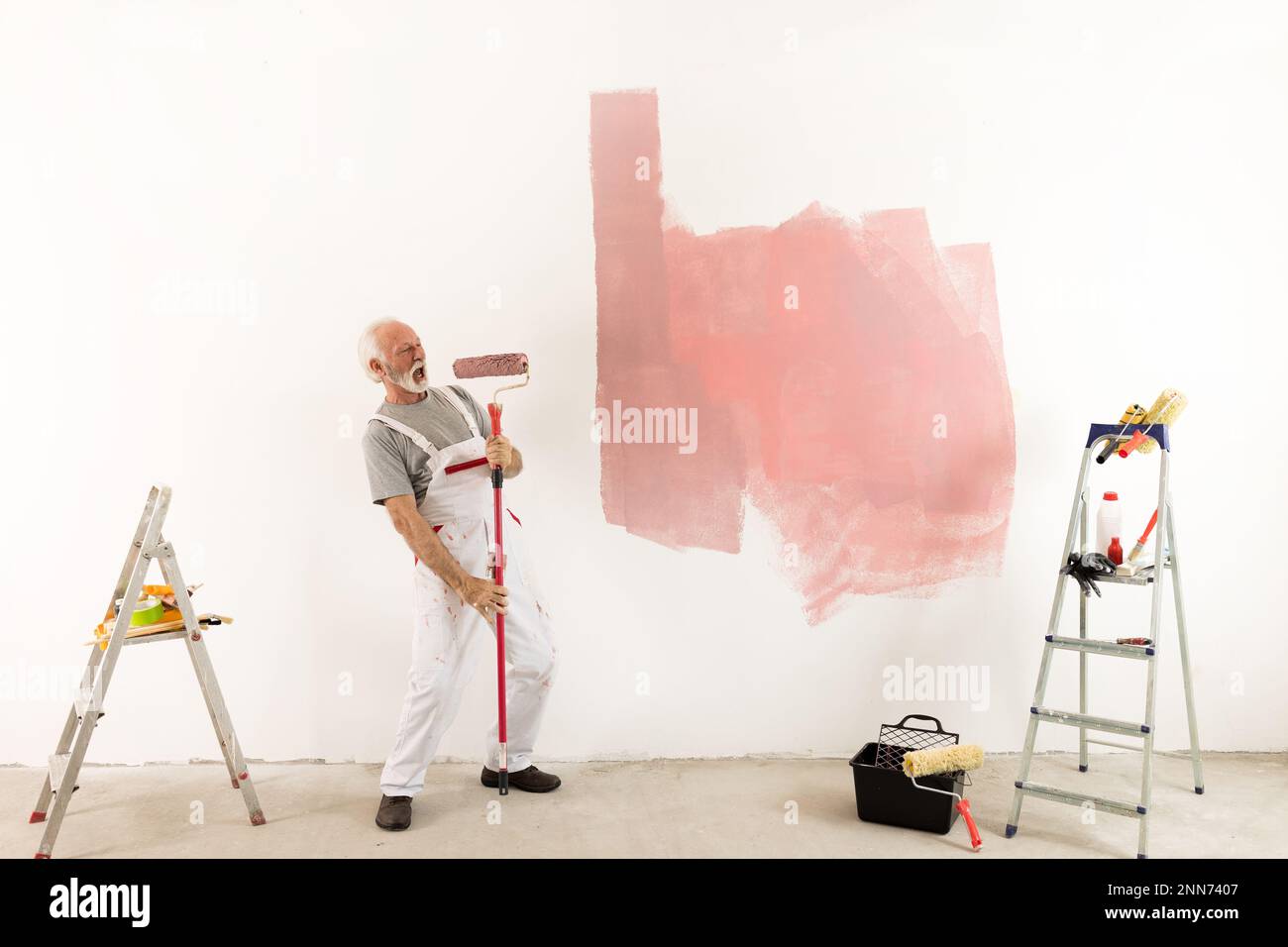 Man having fun during painting hi-res stock photography and images - Alamy