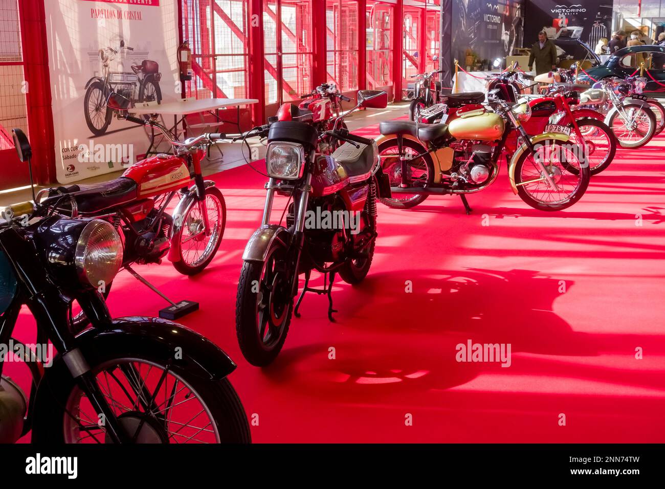 Line of motorcycles at the ClassicMadrid exhibition of classic and vintage cars opened in Madrid and organised by the Salón Internacional del Vehículo Stock Photo
