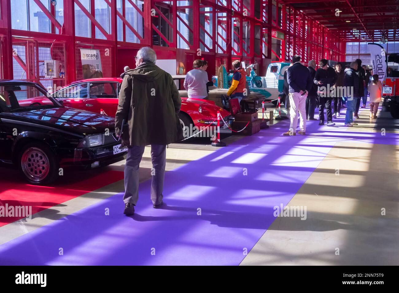 People visitng the ClassicMadrid exhibition of classic and vintage cars opened in Madrid and organised by the Salón Internacional del Vehículo Clásico Stock Photo
