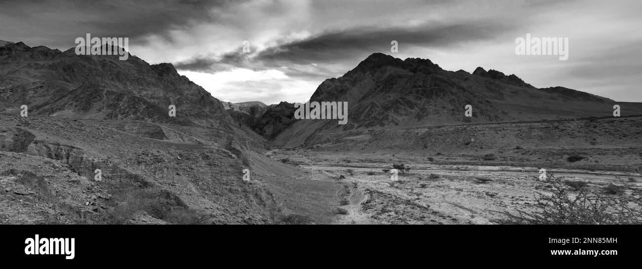 View over the landscape in Wadi Barwas, Al-Sharat, Wadi Araba Desert, south-central Jordan, Middle East. Stock Photo