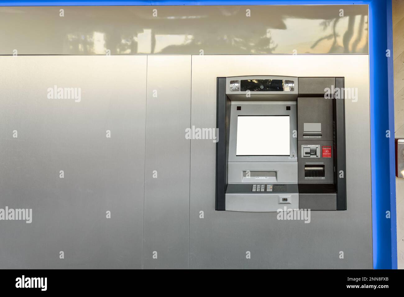 Close up of an outdoor ATM with blank screen. Copy space. Stock Photo