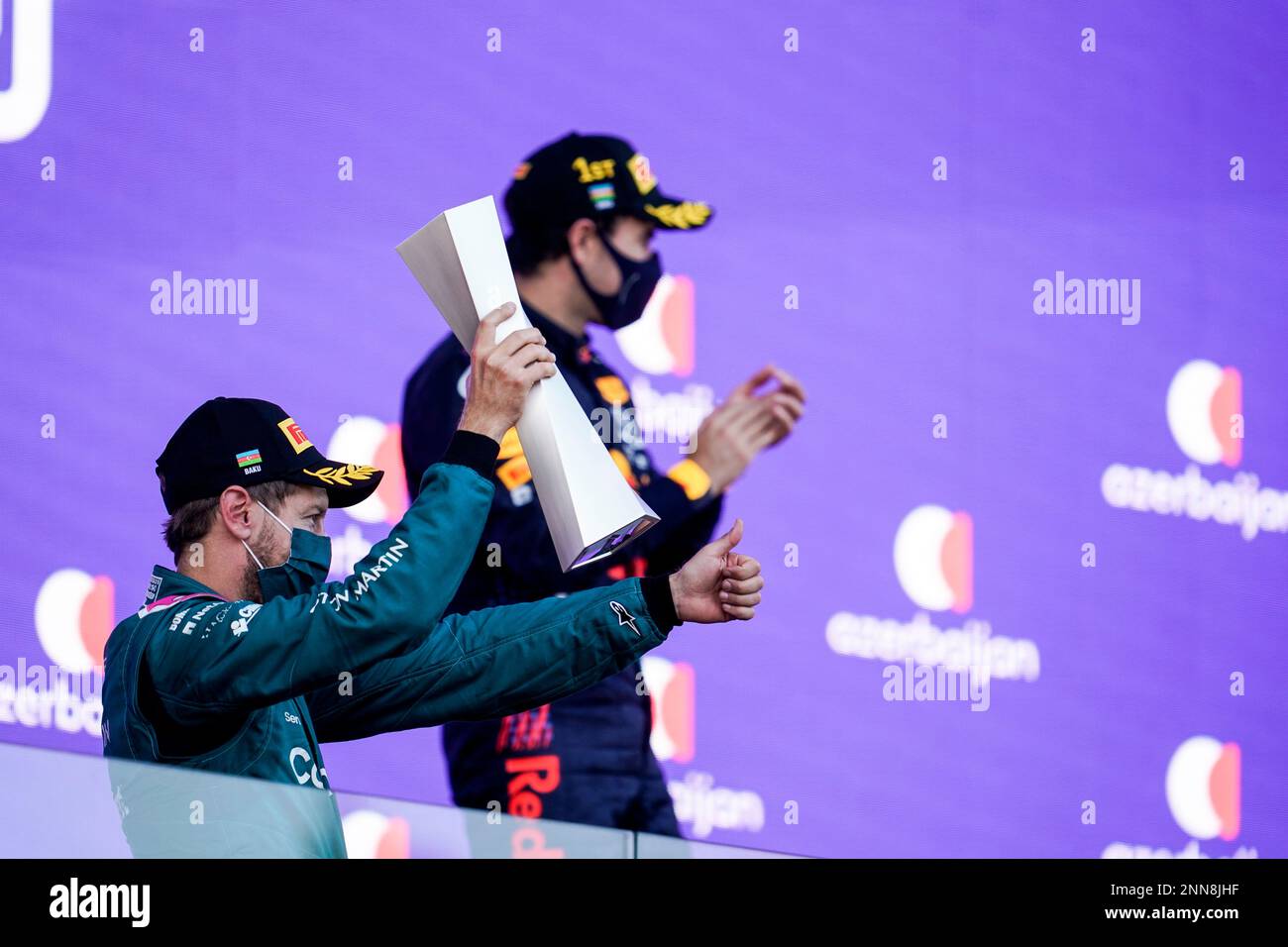 Sebastian Vettel celebrating on the Baku podium for Aston Martin