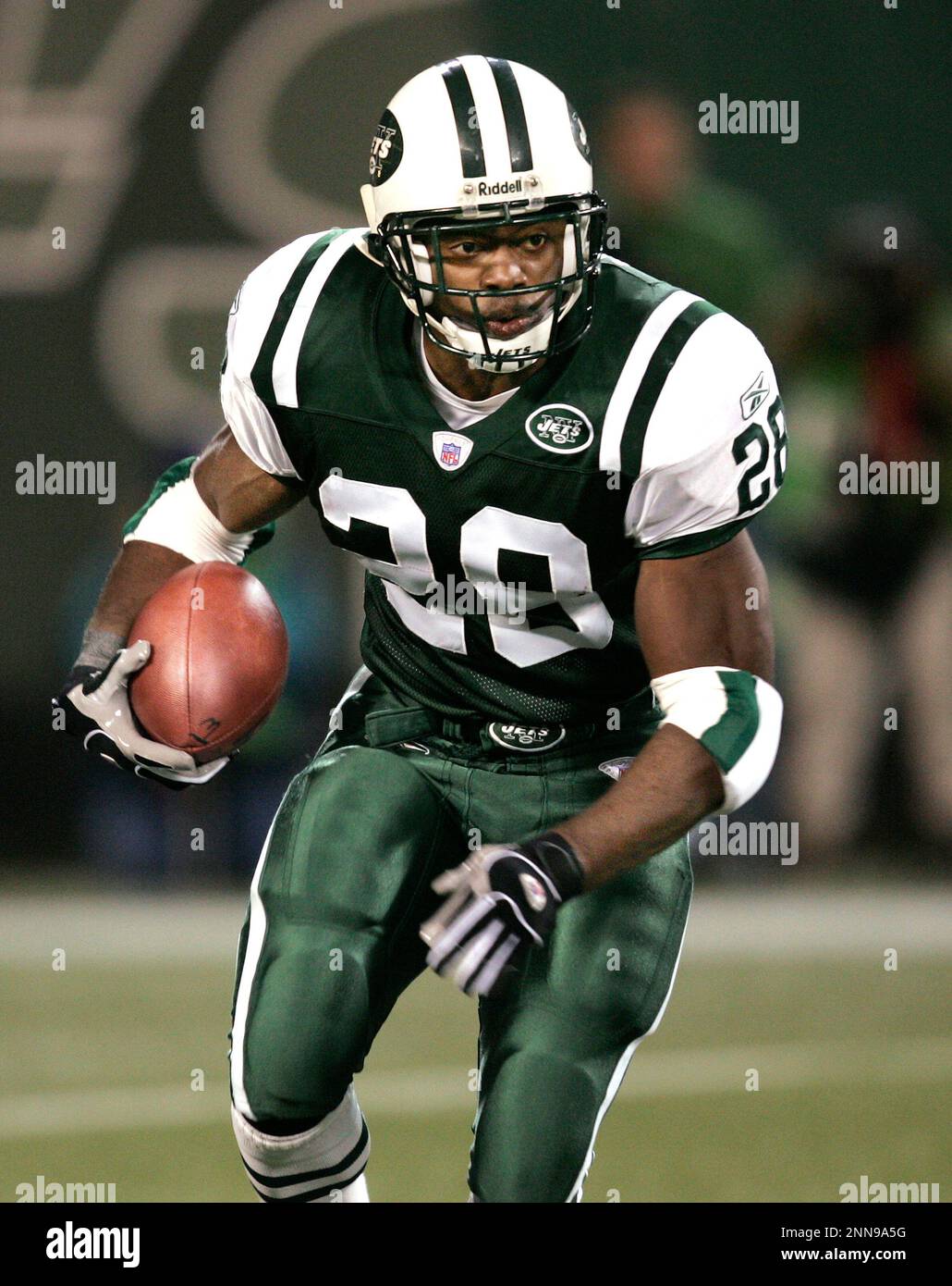EAST RUTHERFORD, NJ - NOVEMBER 01: Jets #28 Curtis Martin drives the ball  during the first half during the New York Jets game versus the Miami  Dolphins in East Rutherford, NJ. (Icon