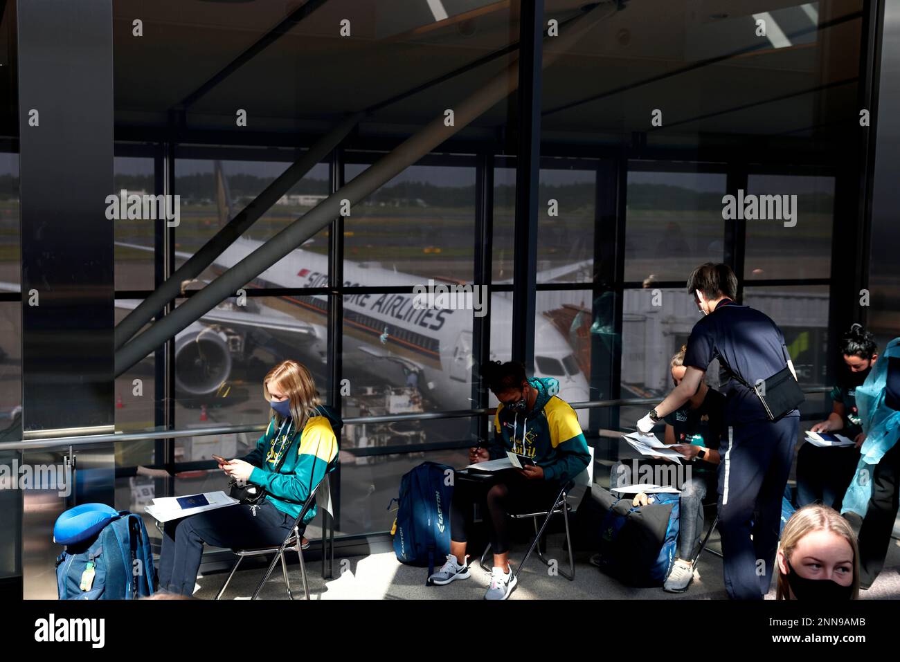 Australian softball national team players wait for the antigen test
