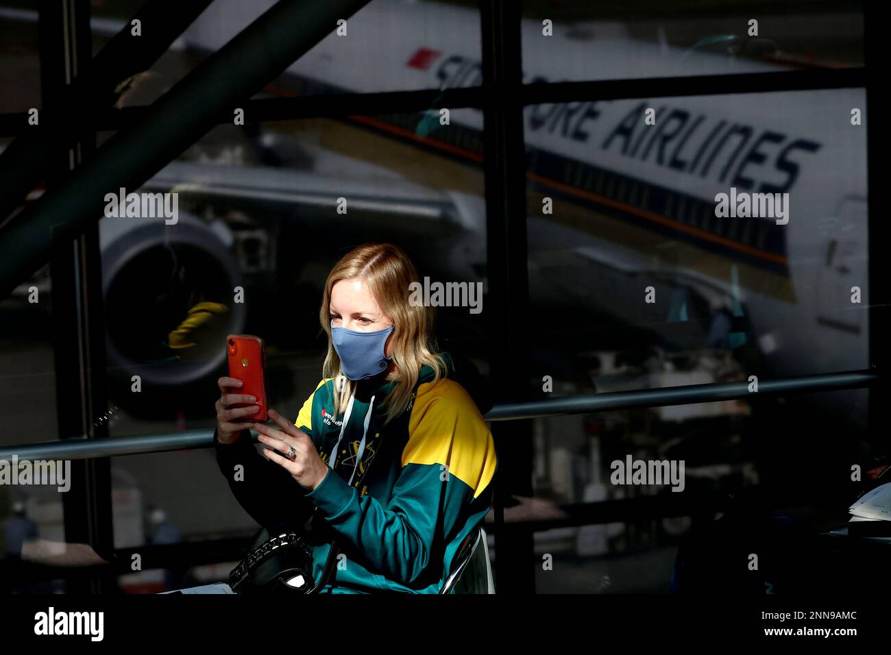 An Australian softball national team player waits for the antigen test