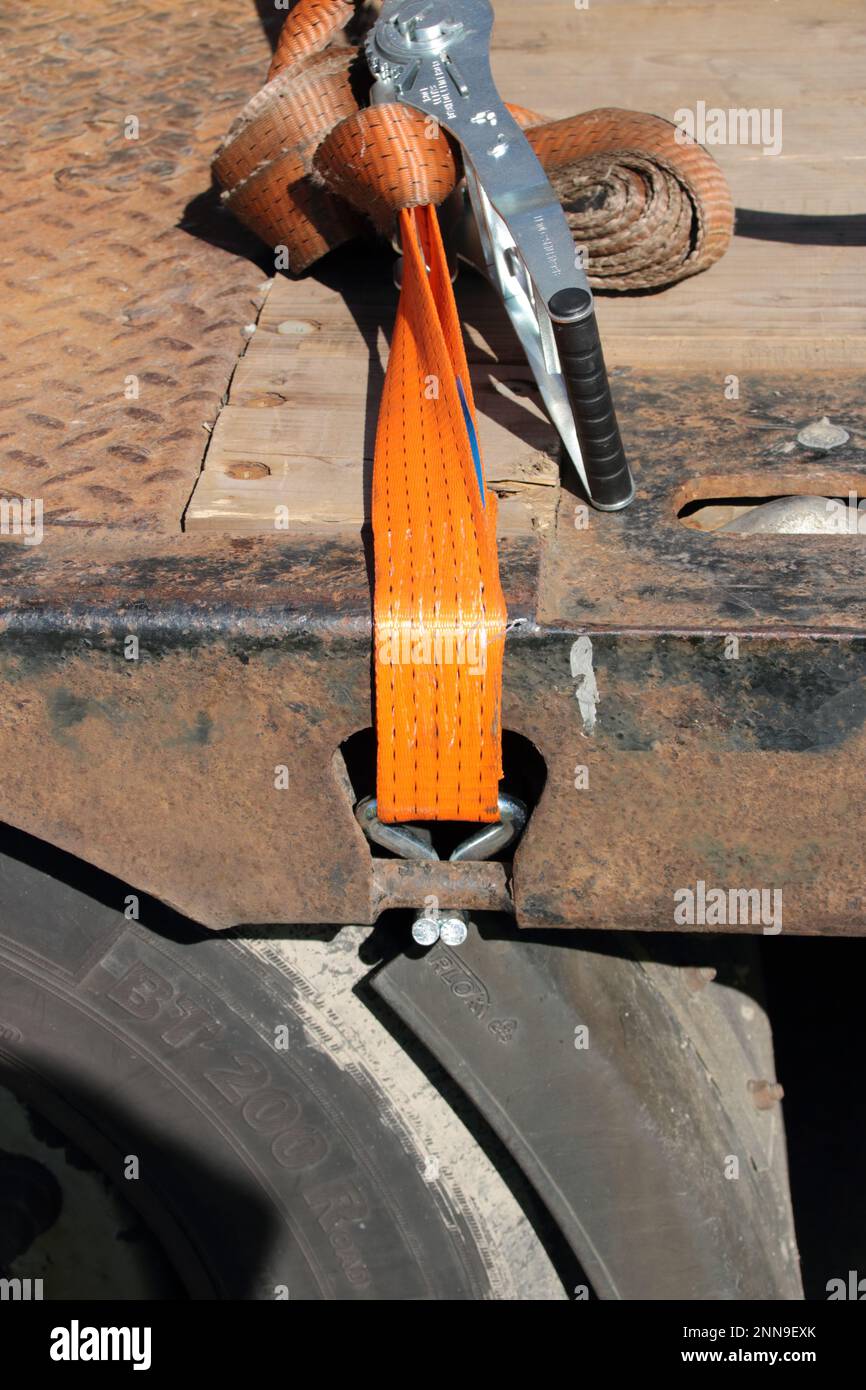 Tension belt is tightened in an eyelet Stock Photo Alamy