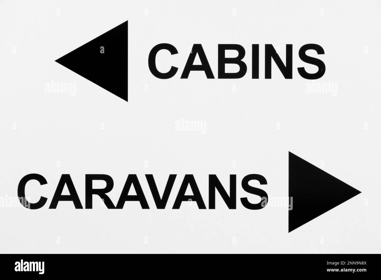 Cabins and Caravan direction sign Stock Photo