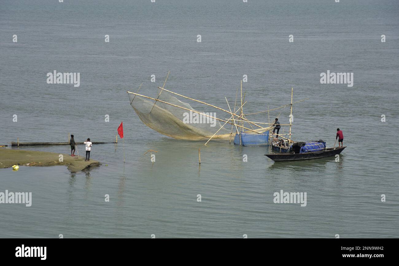 Guwahati, Guwahati, India. 25th Feb, 2023. Fisherman spread his fishing