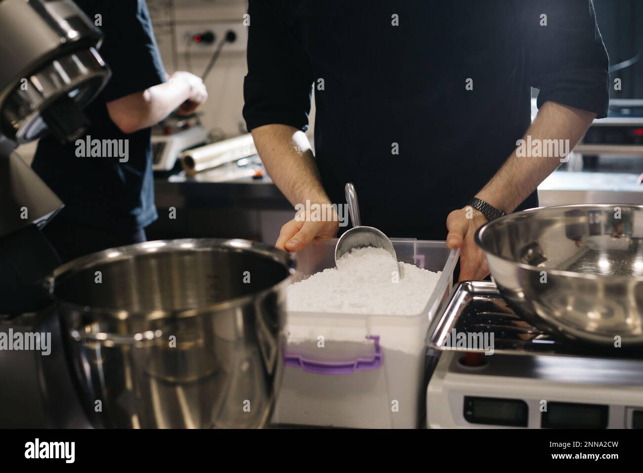 The process of making cakes in a bakery or cafe. The chef works with a