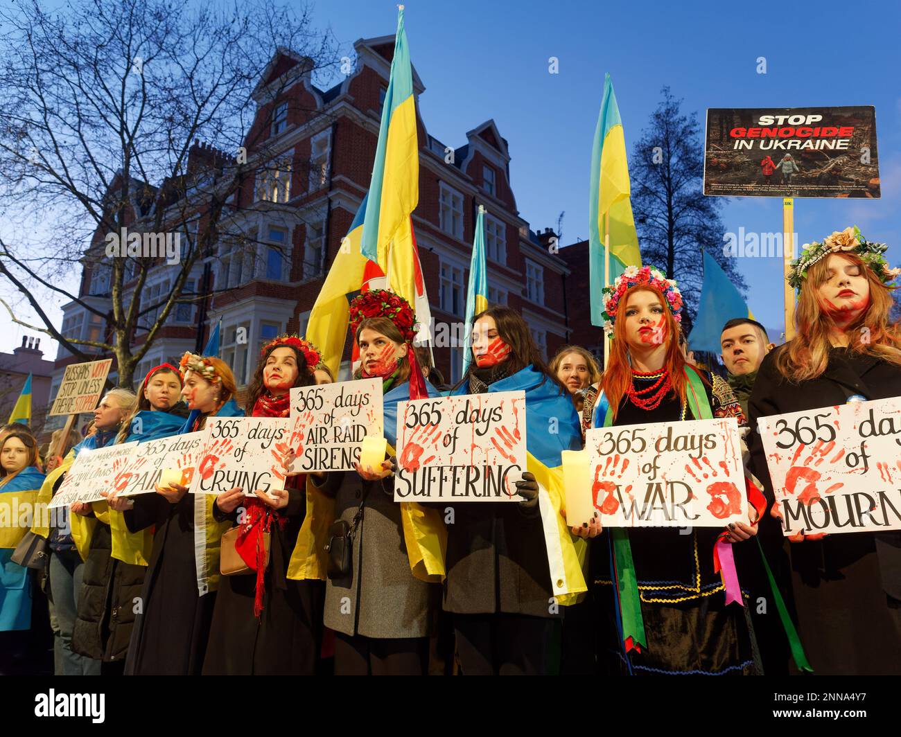 Protesters at a candle lit vigil by the Russian Consulate in London on the first anniversary of the invasion of Ukraine 24 February 2023 Stock Photo
